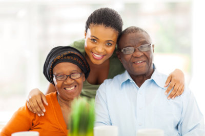 woman and two seniors smiling