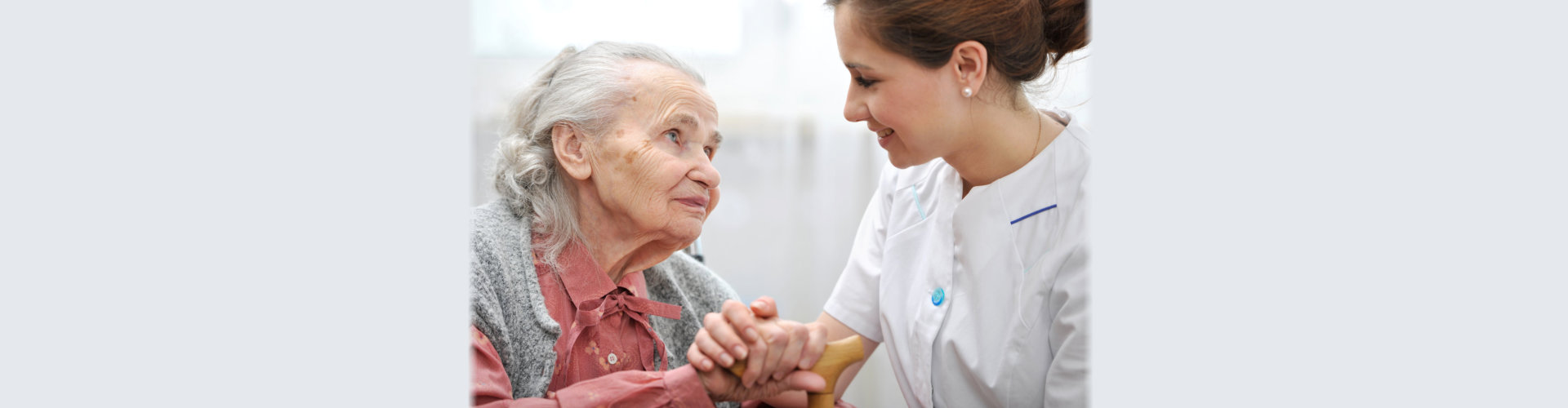 caregiver with an elderly patient